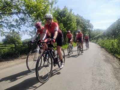 Cyclists riding together